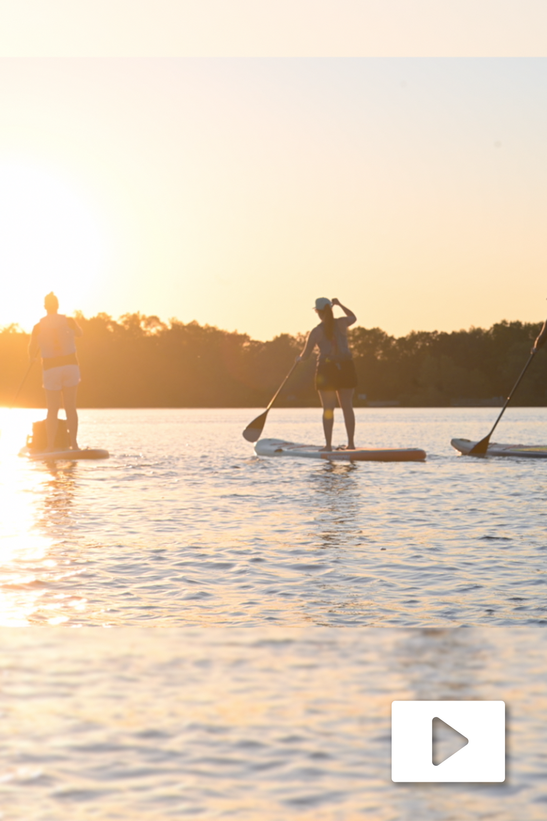 Mission inflatable paddleboards out on the lake for Paddle Club Night