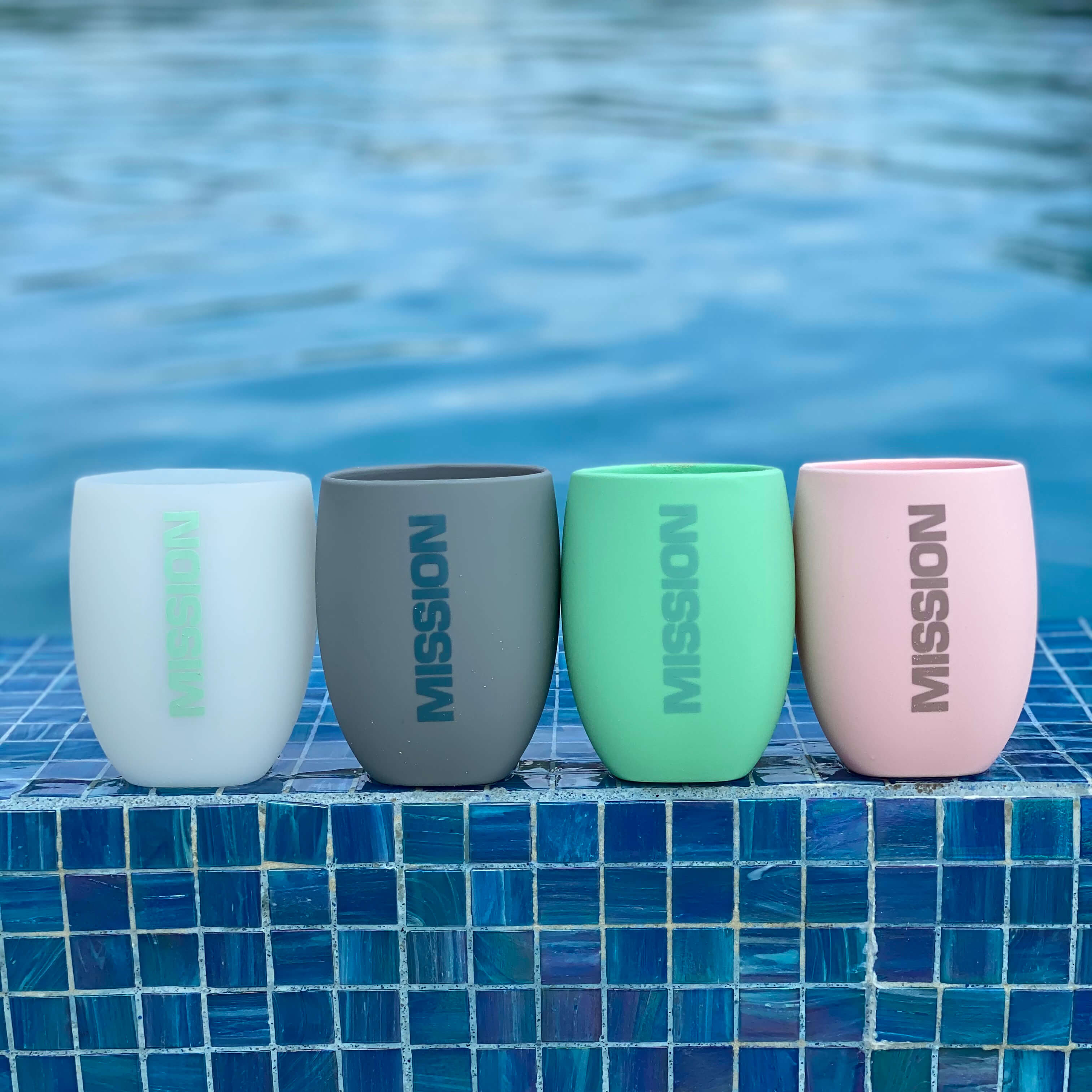 silicone tumblers on net in water