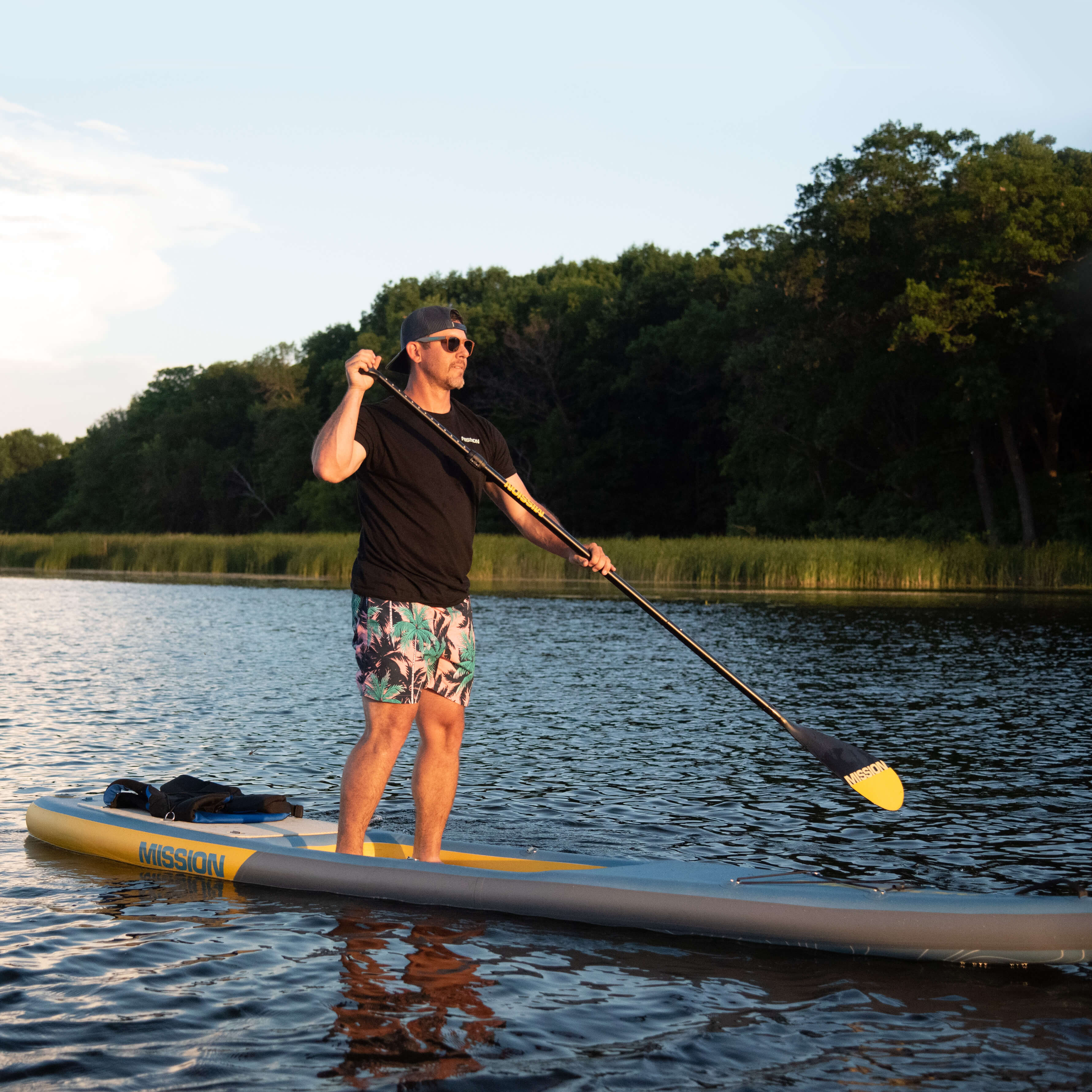 person paddling on STILLWATER Inflatable Kayak + iSUP Crossover
