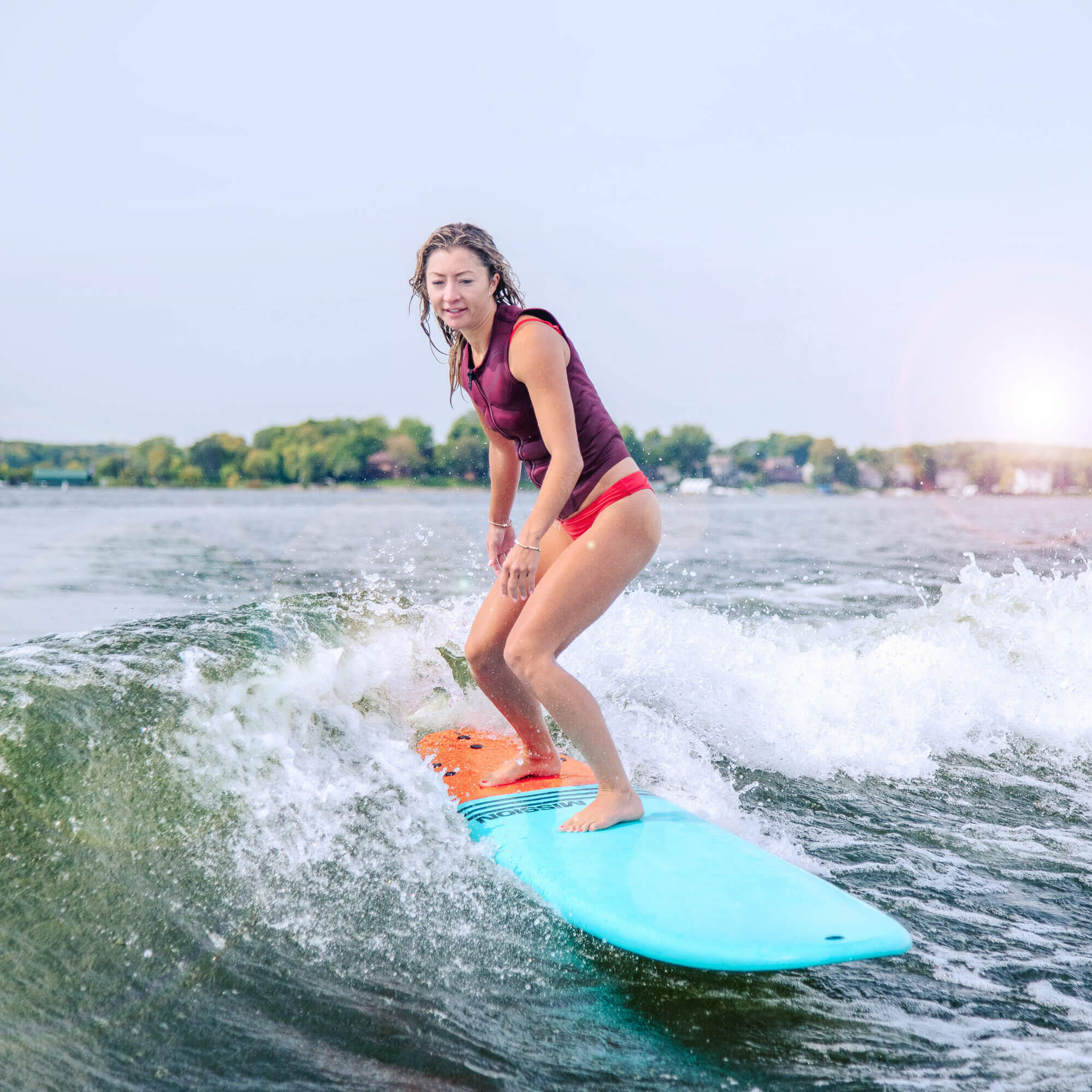 person wakesurfing on TANGO Wakesurf Board 