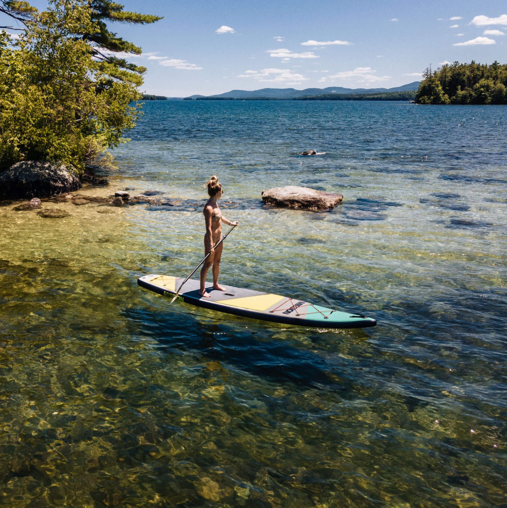 person on TRIDENT Inflatable Touring SUP