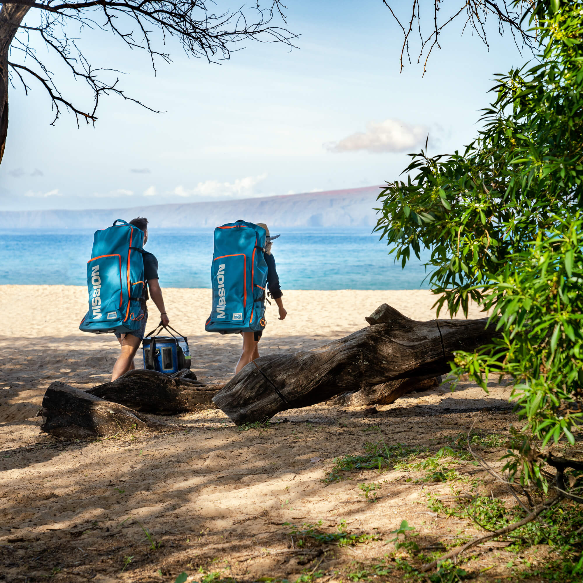 people carrying ZEN Inflatable SUPs