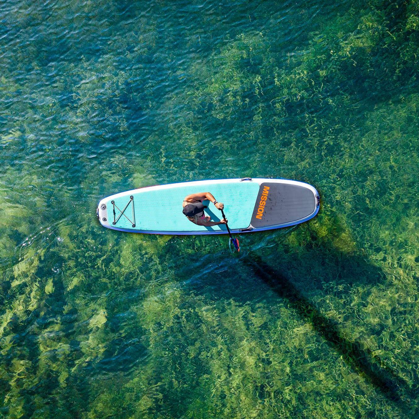 top view of person on ZEN Inflatable SUP in water