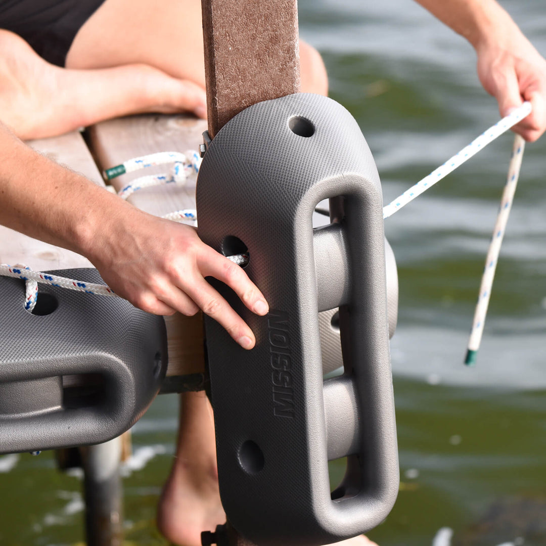people installing boat fender