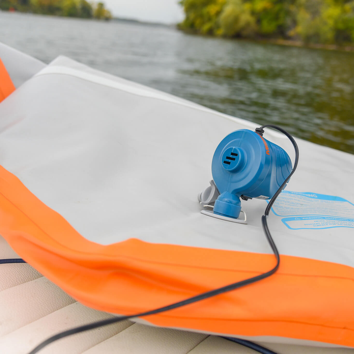 air pump being used to inflate REEF Mat